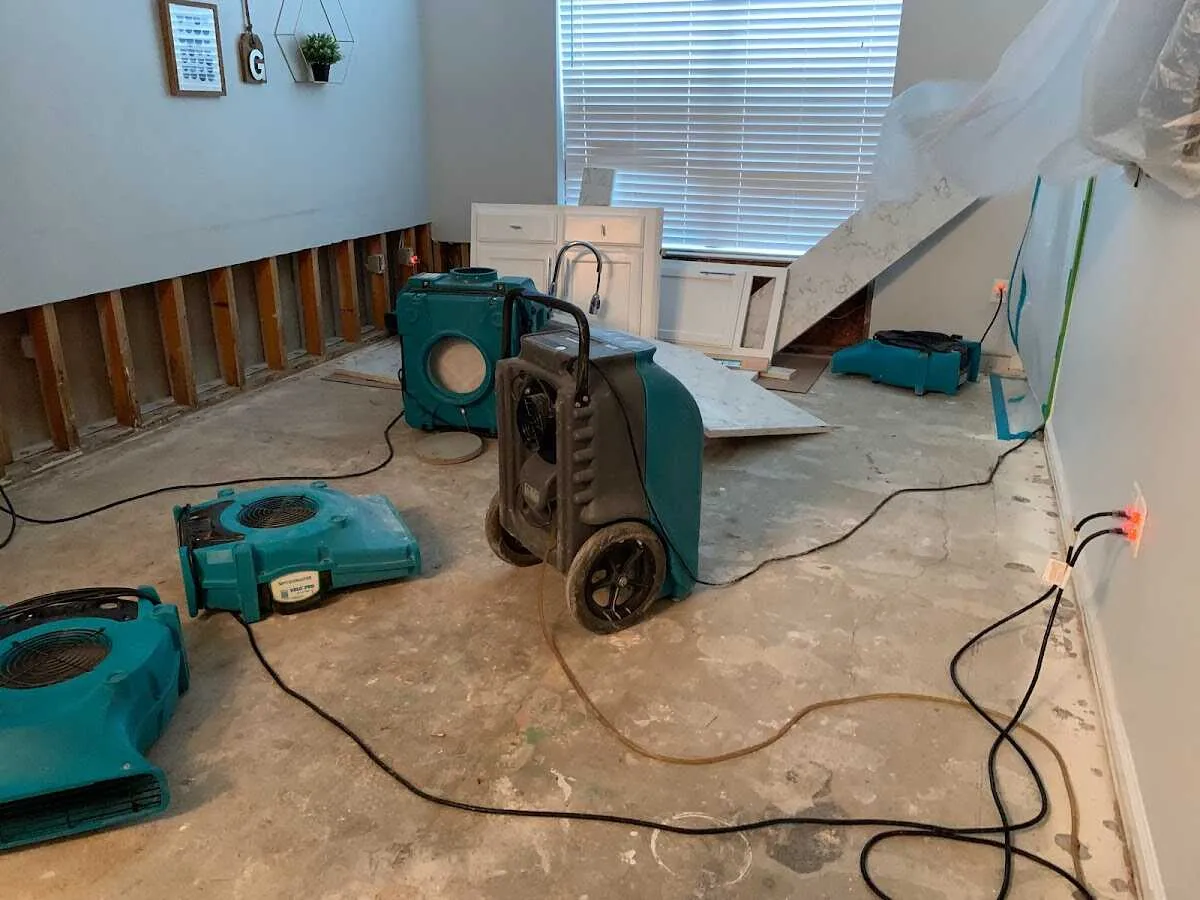 Dehumidifier in flood-cut room for Water Damage Restoration in Archdale
